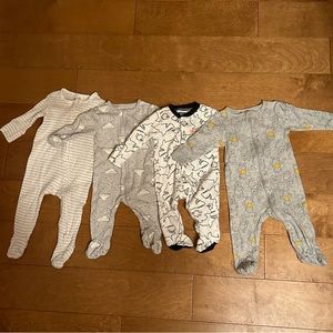 Lot of 4 onesies size 3-6 months ish